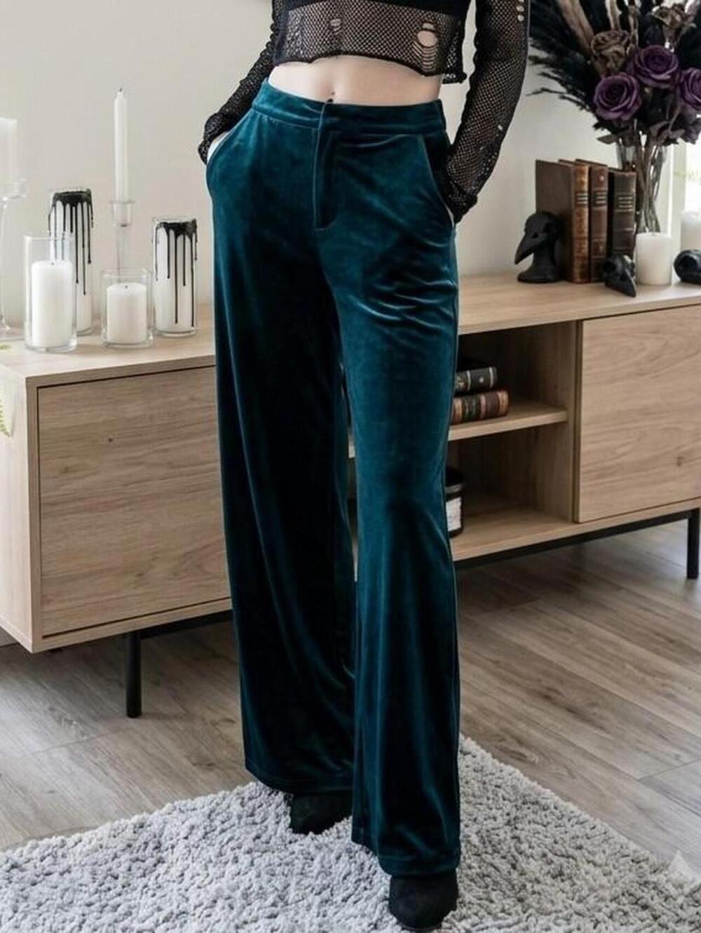 Emerald green velvet wide-leg pants with tie waist and side slit. Size: L
